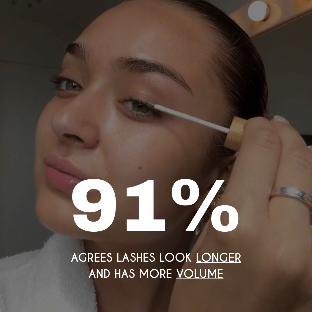 Woman applying eyelash growth serum with the precision applicator
