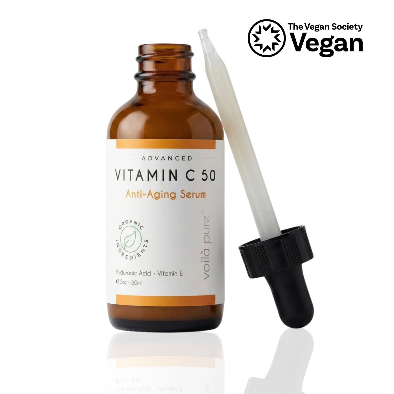 An amber glass dropper bottle labeled 'Advanced Vitamin C 50 Anti-Aging Serum' with a white and orange label, shown next to a white dropper with a black cap on a white background. A 'The Vegan Society Vegan' logo appears in the top right corner.